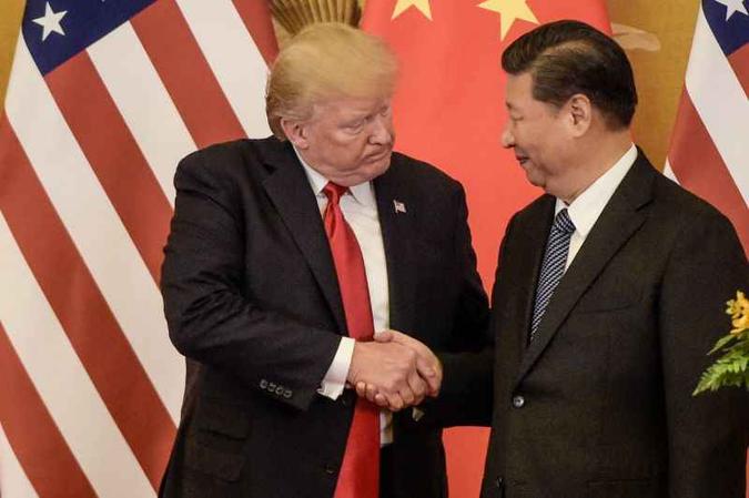 Os presidentes dos Estados Unidos, Donald Trump, e da China, Xi Jinping(foto: Fred DUFOUR/ AFP ) Os presidentes dos Estados Unidos, Donald Trump, e da China, Xi Jinping(foto: Fred DUFOUR/ AFP )
