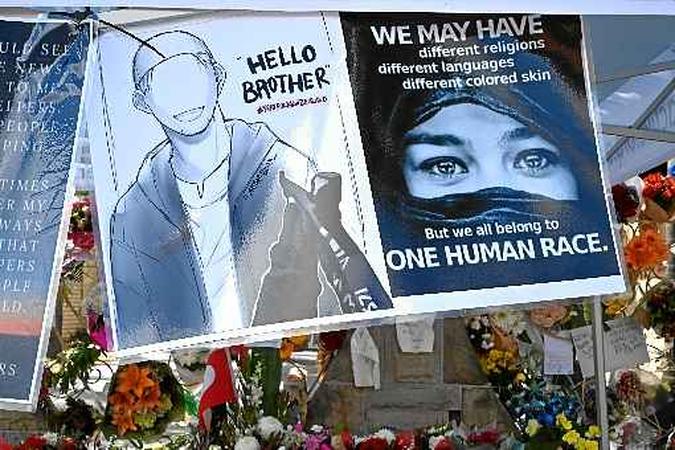 Mensagens de paz exibidas na Austrália, pátria do atirador que matou fiéis em mesquitas de Christchurch: ataque à convivência multicultural (foto: Peter Parks/AFP ) Mensagens de paz exibidas na Austrália, pátria do atirador que matou fiéis em mesquitas de Christchurch: ataque à convivência multicultural (foto: Peter Parks/AFP )