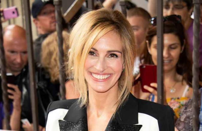 Julia Roberts se incomoda com constantes boatos de que ela e o marido, Danny Moder, estariam se separando(foto: AFP/Valeria Macon) Julia Roberts se incomoda com constantes boatos de que ela e o marido, Danny Moder, estariam se separando(foto: AFP/Valeria Macon)