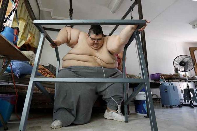 Com hipotireoidismo, hipertensão arterial, diabetes e uma obstrução pulmonar grave, Franco dedicou recuperar sua vida e aceitar a intervenção de uma cirurgia bariátrica (foto: ULISES RUIZ / AFP) Com hipotireoidismo, hipertensão arterial, diabetes e uma obstrução pulmonar grave, Franco dedicou recuperar sua vida e aceitar a intervenção de uma cirurgia bariátrica (foto: ULISES RUIZ / AFP)