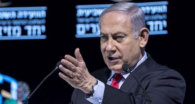 Benjamin Netanyahu falou durante uma conferência em Tel Aviv que o governo é estável e criticou a ação da polícia israelense contra ele(foto: Jack Guez / Agência France-Presse) Benjamin Netanyahu falou durante uma conferência em Tel Aviv que o governo é estável e criticou a ação da polícia israelense contra ele(foto: Jack Guez / Agência France-Presse)