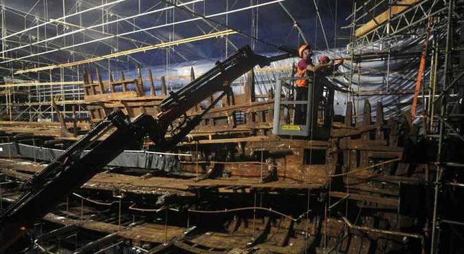 Uma parte do navio ficou enterrada na lama do leito marinho, e o resto desapareceu devido à erosão(foto: Carl Court/AFP) Uma parte do navio ficou enterrada na lama do leito marinho, e o resto desapareceu devido à erosão(foto: Carl Court/AFP)