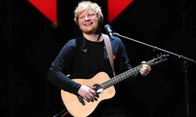 Ed Sheeran esteve no Brasil em 2017 com a turnê(foto: AFP / Angela Weiss) Ed Sheeran esteve no Brasil em 2017 com a turnê(foto: AFP / Angela Weiss)