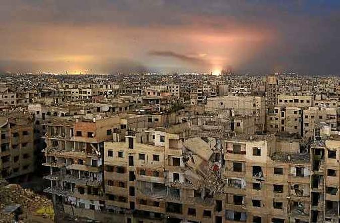 O enclave rebelde de Ghouta, sob ataque incessante do governo: civis encurralados(foto: Ammar Suleiman/AFP) O enclave rebelde de Ghouta, sob ataque incessante do governo: civis encurralados(foto: Ammar Suleiman/AFP)