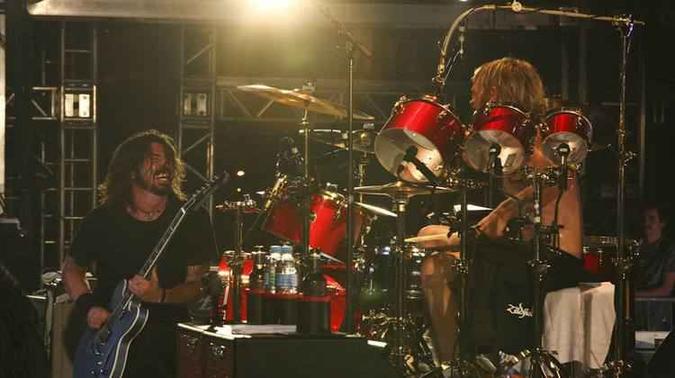Foo Fighters se apresentaram na edição de 2012 do Lollapalooza Brasil(foto: Cambria Harkay/Divulgação) Foo Fighters se apresentaram na edição de 2012 do Lollapalooza Brasil(foto: Cambria Harkay/Divulgação)