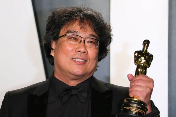 Conquistas inesperadas: quatro prêmios Oscar vieram para a produção do sul-coreano Bong Joon Ho, que esteve bem incrédulo, no palco da cerimônia(foto: Jean Pierre Lacreaux/ Divulgação) Conquistas inesperadas: quatro prêmios Oscar vieram para a produção do sul-coreano Bong Joon Ho, que esteve bem incrédulo, no palco da cerimônia(foto: Jean Pierre Lacreaux/ Divulgação)