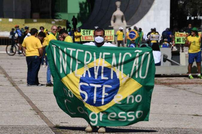 Guerra política em meio à covid-19: apoiadores de Bolsonaro ameaçam o STF, considerado uma ''vergonha''(foto: AFP / EVARISTO SA) Guerra política em meio à covid-19: apoiadores de Bolsonaro ameaçam o STF, considerado uma ''vergonha''(foto: AFP / EVARISTO SA)