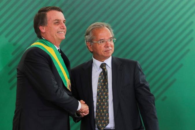 Bolsonaro e Paulo Guedes(foto: AFP / Sergio LIMA) Bolsonaro e Paulo Guedes(foto: AFP / Sergio LIMA)