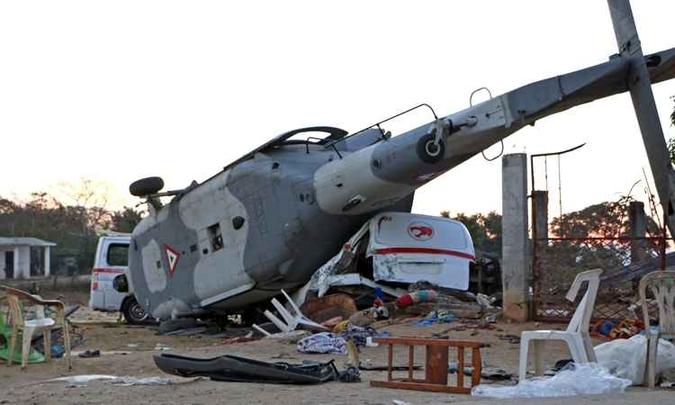 A 40 metros de aterrissar, o piloto perdeu o controle e a aeronave despencou(foto: AFP/PATRICIA CASTELLANOS ) A 40 metros de aterrissar, o piloto perdeu o controle e a aeronave despencou(foto: AFP/PATRICIA CASTELLANOS )