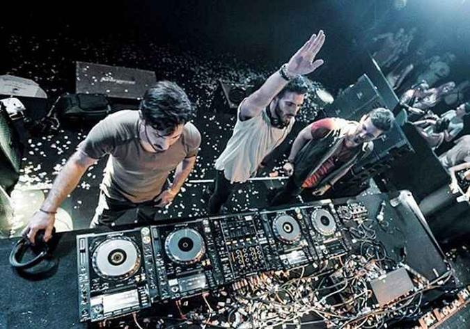 Audax, trio de DJs composto pelos irmãos André, Pedro e João(foto: Instagram/Junior Pelaez/Reprodução ) Audax, trio de DJs composto pelos irmãos André, Pedro e João(foto: Instagram/Junior Pelaez/Reprodução )