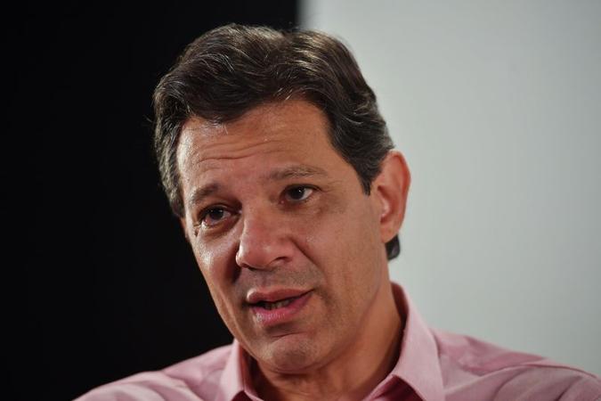 Haddad disse também que pretende cobrar de Bolsonaro reparação por informações mentirosas(foto: AFP) Haddad disse também que pretende cobrar de Bolsonaro reparação por informações mentirosas(foto: AFP)