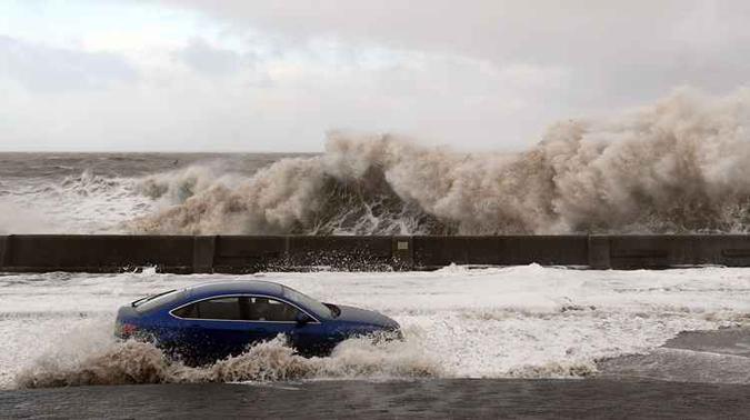 Tempestade provocou inundações na Inglaterra(foto: Paul Ellis/AFP) Tempestade provocou inundações na Inglaterra(foto: Paul Ellis/AFP)