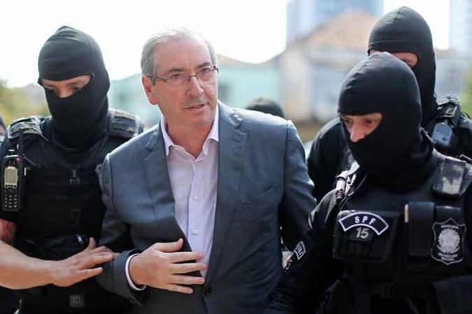 Ex-presidente da Câmara e mais quatro participaram de um esquema de desvios da Caixa Econômica Federal(foto: AFP PHOTO / Heuler Andrey) Ex-presidente da Câmara e mais quatro participaram de um esquema de desvios da Caixa Econômica Federal(foto: AFP PHOTO / Heuler Andrey)