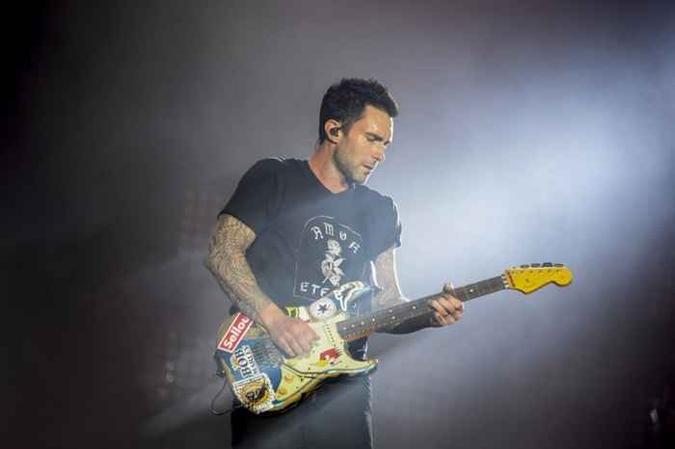 A banda Maroon 5 é uma das principais deste sábado (16)(foto: AFP / Apu Gomes) A banda Maroon 5 é uma das principais deste sábado (16)(foto: AFP / Apu Gomes)