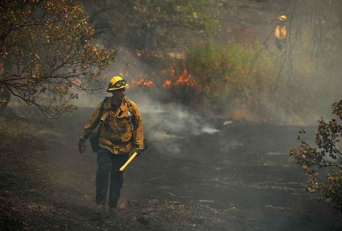 Carr também tirou a vida de dois bombeiros e três vizinhos de Redding(foto: Justin Sullivan/AFP) Carr também tirou a vida de dois bombeiros e três vizinhos de Redding(foto: Justin Sullivan/AFP)