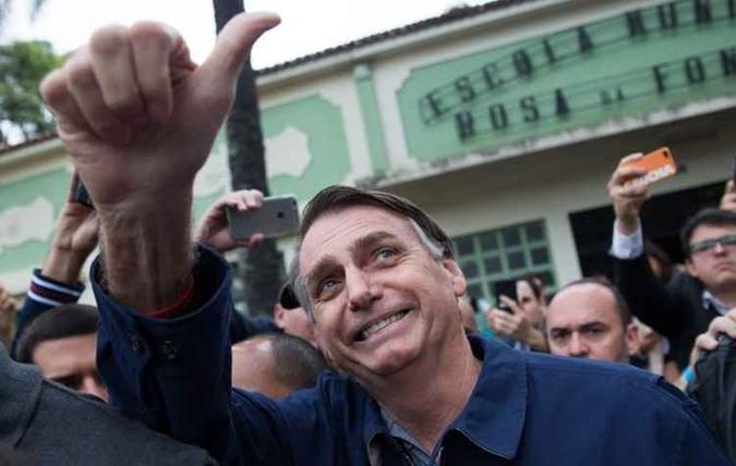 O PTB decidiu apoiar Jair Bolsonaro (PSL) no segundo turno(foto: AFP) O PTB decidiu apoiar Jair Bolsonaro (PSL) no segundo turno(foto: AFP)