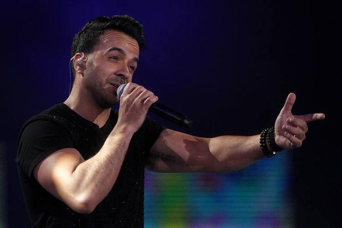 Luis Fonsi está se apresentando com sua turnê 'Love and Dance' (foto: CLAUDIO REYES) Luis Fonsi está se apresentando com sua turnê 'Love and Dance' (foto: CLAUDIO REYES)