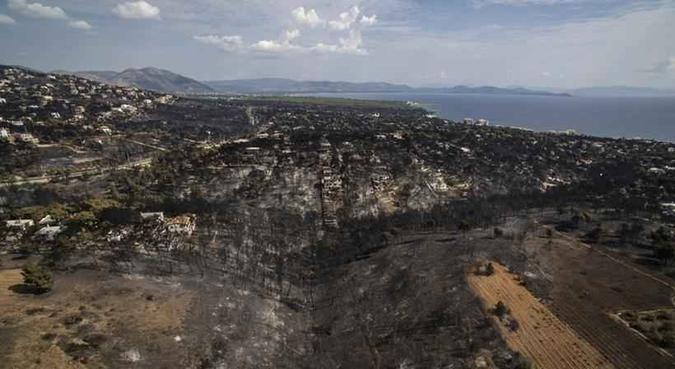 As famílias das vítimas não puderam ver os corpos(foto: Savvas Karmaniola/AFP) As famílias das vítimas não puderam ver os corpos(foto: Savvas Karmaniola/AFP)