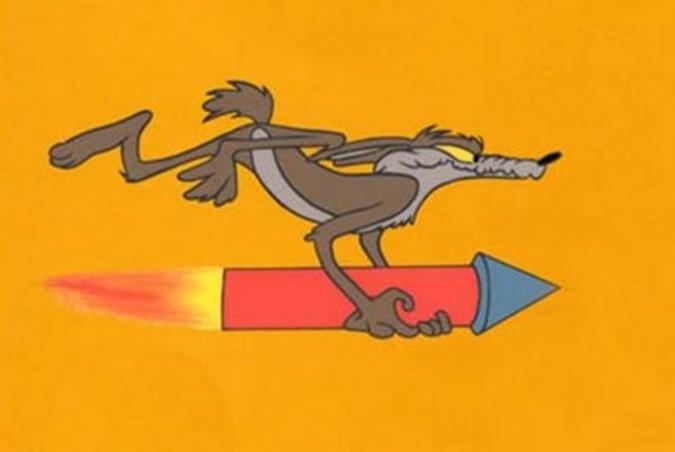 Coyote pega carona em um dos produtos da empresa Acme(foto: Warner Bros./Divulgação) Coyote pega carona em um dos produtos da empresa Acme(foto: Warner Bros./Divulgação)
