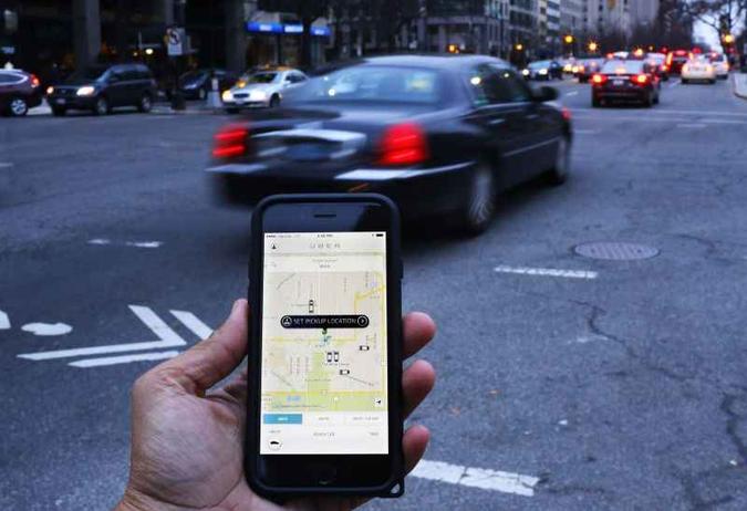 Para especialistas, a 99, principal concorrente da Uber no Brasil, consegue compensar os problemas da concorrente com mais agilidade(foto: Andrew Caballero-Reynolds) Para especialistas, a 99, principal concorrente da Uber no Brasil, consegue compensar os problemas da concorrente com mais agilidade(foto: Andrew Caballero-Reynolds)
