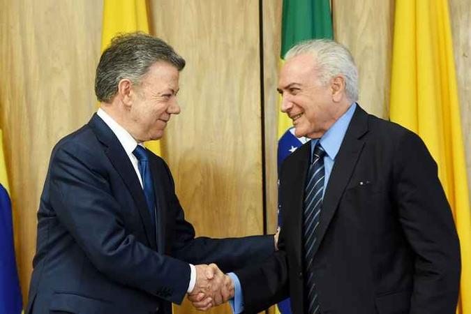 Michel Temer e o presidente da Colômbia, Juan Manuel Santos, se reuniram nesta terça-feira (20/3)(foto: Evaristo Sa / AFP ) Michel Temer e o presidente da Colômbia, Juan Manuel Santos, se reuniram nesta terça-feira (20/3)(foto: Evaristo Sa / AFP )