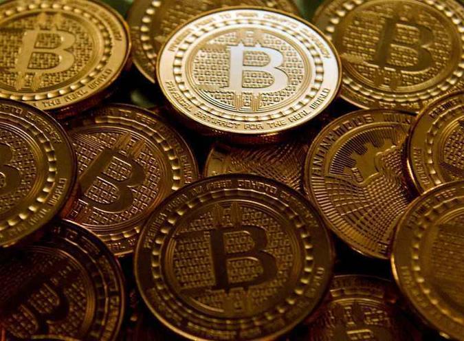 Transações com bitcoin crescem e o valor total da moeda em circulação no mundo é estimado em US$ 180 bilhões(foto: Karen Bleier/AFP) Transações com bitcoin crescem e o valor total da moeda em circulação no mundo é estimado em US$ 180 bilhões(foto: Karen Bleier/AFP)