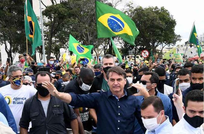 Para Bolsonaro, a pouca idade dos jogadores é fator que afasta a letalidade, caso algum deles contraia covid-19(foto: EVARISTO SA/CB/D.A Press) Para Bolsonaro, a pouca idade dos jogadores é fator que afasta a letalidade, caso algum deles contraia covid-19(foto: EVARISTO SA/CB/D.A Press)
