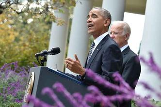 Obama discursou no jardim da Casa Branca, ao lado do vice, Joe Biden(foto: Nicholas Kamm/AFP) Obama discursou no jardim da Casa Branca, ao lado do vice, Joe Biden(foto: Nicholas Kamm/AFP)