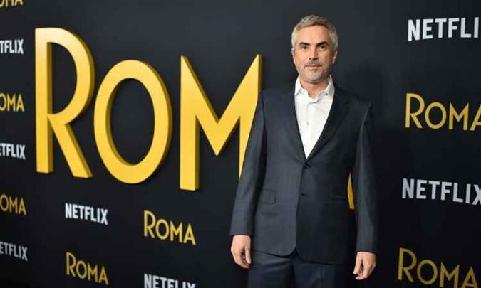 Favorito, o diretor mexicano Alfonso Cuáron conquistou por dois prêmios por 'Roma'(foto: Robyn Beck/AFP) Favorito, o diretor mexicano Alfonso Cuáron conquistou por dois prêmios por 'Roma'(foto: Robyn Beck/AFP)