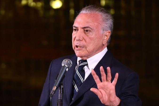 Em sua postagem na rede social, Temer destacou que os canais de denúncia são fundamentais(foto: AFP/Evaristo Sá) Em sua postagem na rede social, Temer destacou que os canais de denúncia são fundamentais(foto: AFP/Evaristo Sá)