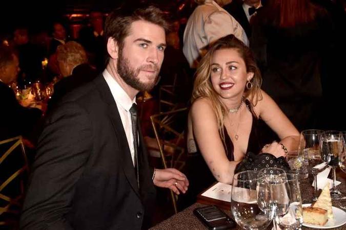 Between going back and forth Miley Cyrus and Liam Hemsworth are celebrating a d Between going back and forth Miley Cyrus and Liam Hemsworth are celebrating a d