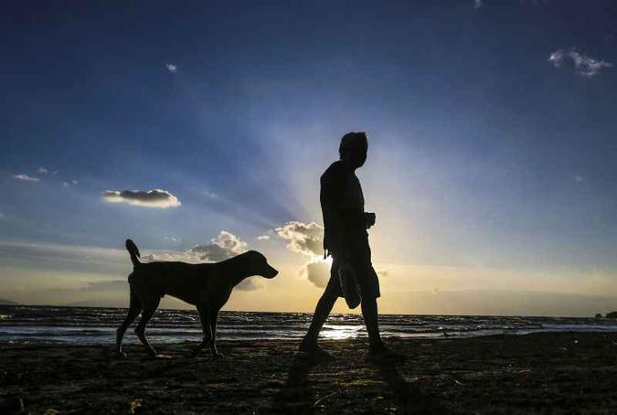 Estudo da domesticação de cães também ajuda a identificar detalhes das correntes migratórias humanas(foto: AFP PHOTO / Inti OCON ) Estudo da domesticação de cães também ajuda a identificar detalhes das correntes migratórias humanas(foto: AFP PHOTO / Inti OCON )