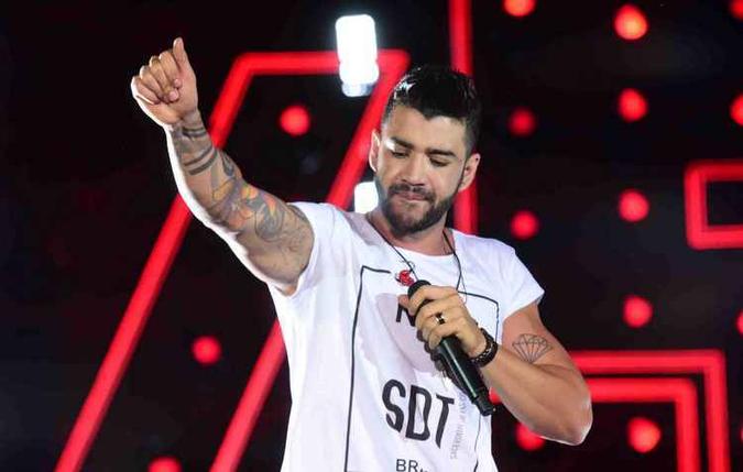Um policial militar do estado do Mato Grosso foi preso na madrugada deste sábado (4) após efetuar diversos disparos durante o show do cantor sertanejo Gusttavo Lima, na cidade de Rondonópolis, a 218 km de Cuiabá(foto: Reprodução) Um policial militar do estado do Mato Grosso foi preso na madrugada deste sábado (4) após efetuar diversos disparos durante o show do cantor sertanejo Gusttavo Lima, na cidade de Rondonópolis, a 218 km de Cuiabá(foto: Reprodução)
