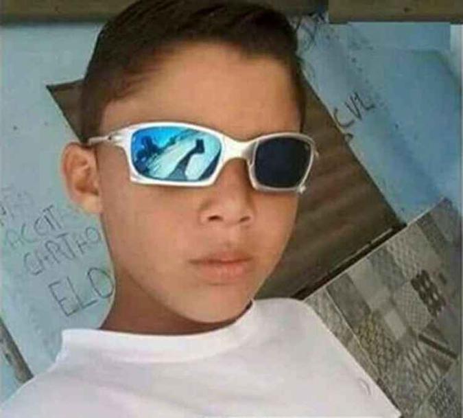 Gabriel Santos Lopes, 11 anos, teria sido morto por engano em uma suposta rixa entre gangues(foto: Reprodução/Rede Social) Gabriel Santos Lopes, 11 anos, teria sido morto por engano em uma suposta rixa entre gangues(foto: Reprodução/Rede Social)