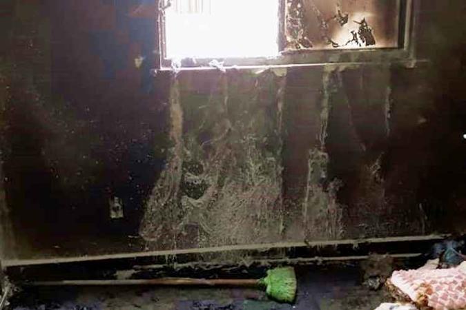 A sala ficou totalmente destruída pelo incêndio(foto: Arquivo Pessoal) A sala ficou totalmente destruída pelo incêndio(foto: Arquivo Pessoal)