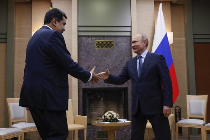 Maduro se reuniu na quarta-feira na residência oficial de Novo Ogarevo com seu colega russo, Vladimir Putin(foto: AFP) Maduro se reuniu na quarta-feira na residência oficial de Novo Ogarevo com seu colega russo, Vladimir Putin(foto: AFP)
