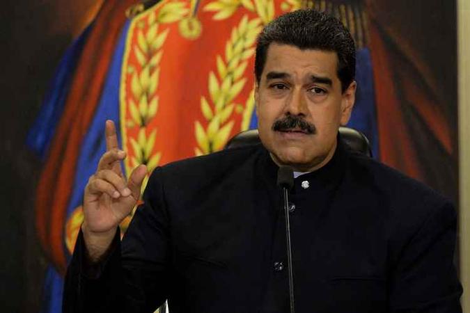 Maduro dirigiu seu convite aos deputados Julio Borges, Luis Florido, Timoteo Zambrano e Aquiles Moreno(foto: AFP/FEDERICO PARRA) Maduro dirigiu seu convite aos deputados Julio Borges, Luis Florido, Timoteo Zambrano e Aquiles Moreno(foto: AFP/FEDERICO PARRA)