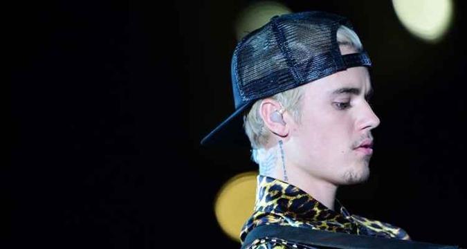 Bieber teria dado um soco em homem que segurava mulher pela garganta no after do Coachella(foto: ROBYN BECK) Bieber teria dado um soco em homem que segurava mulher pela garganta no after do Coachella(foto: ROBYN BECK)