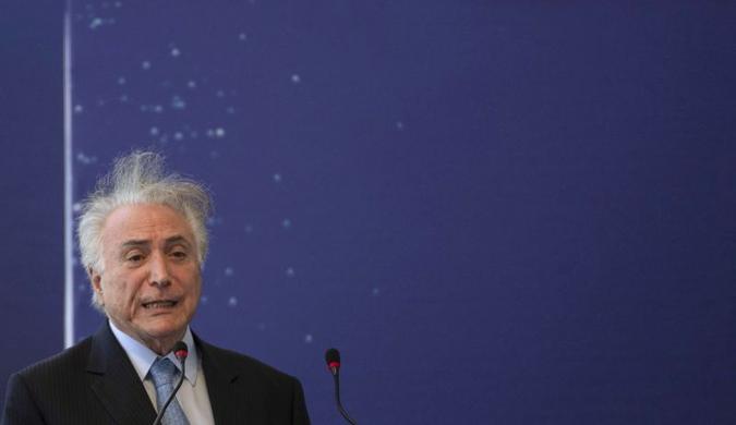 Essa é a terceira denúncia apresentada contra Michel Temer pela PGR desde que ele assumiu o cargo(foto: Mauro Pimentel/AFP) Essa é a terceira denúncia apresentada contra Michel Temer pela PGR desde que ele assumiu o cargo(foto: Mauro Pimentel/AFP)