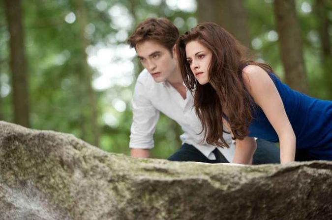 'A Saga Crepúsculo: Amanhecer - Parte 2' arrecadou US$ 829,7 milhões em todo o mundo e é uma das maiores bilheterias da história do cinema(foto: Paris Filmes/Divulgação) 'A Saga Crepúsculo: Amanhecer - Parte 2' arrecadou US$ 829,7 milhões em todo o mundo e é uma das maiores bilheterias da história do cinema(foto: Paris Filmes/Divulgação)