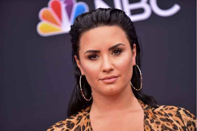 A cantora estava ausente da rede social desde a suposta overdose no meio do ano(foto: AFP / LISA O'CONNOR) A cantora estava ausente da rede social desde a suposta overdose no meio do ano(foto: AFP / LISA O'CONNOR)