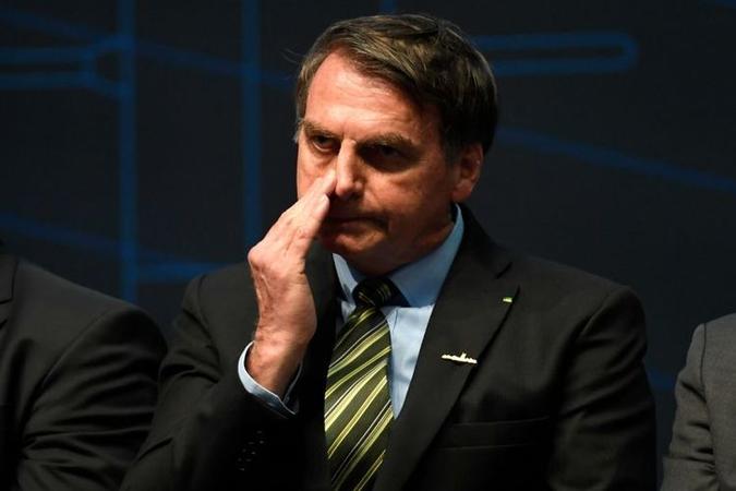 Presidente discute saídas jurídicas para que parlamentares possam sair do partido sem punição(foto: AFP / Mauro Pimentel / Mauro Pimentel) Presidente discute saídas jurídicas para que parlamentares possam sair do partido sem punição(foto: AFP / Mauro Pimentel / Mauro Pimentel)