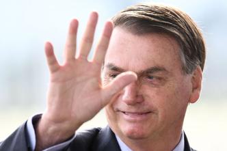 Na última quinta-feira (07) o presidente editou o decreto e adicionou ao rol de serviços essenciais a construção civil e atividades industriais(foto: AFP / EVARISTO SA) Na última quinta-feira (07) o presidente editou o decreto e adicionou ao rol de serviços essenciais a construção civil e atividades industriais(foto: AFP / EVARISTO SA)