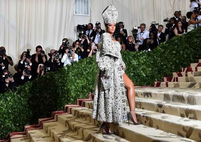 A riqueza de Rihanna é dividida em diferentes projetos(foto: HECTOR RETAMAL/ AFP) A riqueza de Rihanna é dividida em diferentes projetos(foto: HECTOR RETAMAL/ AFP)