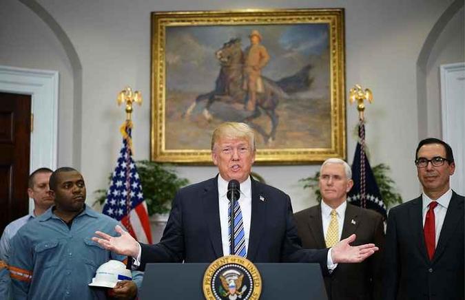 Os motivos alegados pelo presidente Donald Trump foram segurança nacional e proteção das industrias norte-americanas(foto: FP / MANDEL NGAN) Os motivos alegados pelo presidente Donald Trump foram segurança nacional e proteção das industrias norte-americanas(foto: FP / MANDEL NGAN)