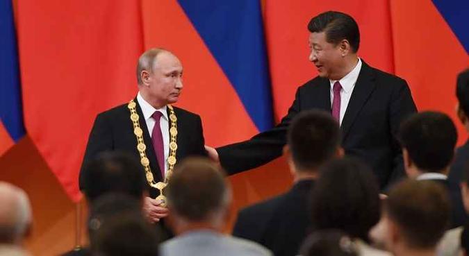 A medalha foi criada para reconhecer estrangeiros que deram uma contribuição expecional ao processo de modernização socialista da China(foto: Greg Baker / AFP) A medalha foi criada para reconhecer estrangeiros que deram uma contribuição expecional ao processo de modernização socialista da China(foto: Greg Baker / AFP)