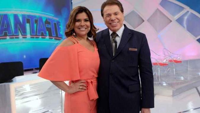 Silvio brincou ainda com a idade da apresentadora(foto: SBT/Reprodução) Silvio brincou ainda com a idade da apresentadora(foto: SBT/Reprodução)