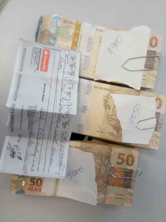 Trio foi preso com cheque falso de R$ 35 milhões e R$ 14 mil em dinheiro(foto: Divulgação/PMDF) Trio foi preso com cheque falso de R$ 35 milhões e R$ 14 mil em dinheiro(foto: Divulgação/PMDF)