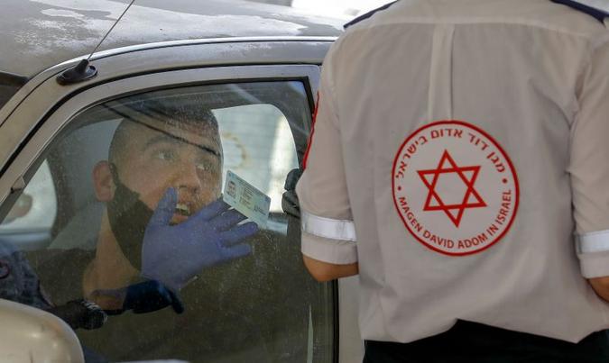 País tem 8.900 casos de contágio e 57 mortes(foto: Ahmad GHARABLI/AFP) País tem 8.900 casos de contágio e 57 mortes(foto: Ahmad GHARABLI/AFP)
