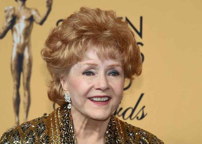 Carrie Fisher ficou conhecida no cinema por viver a personagem Leia na saga(foto: AFP / GETTY IMAGES NORTH AMERICA / Ethan Miller) Carrie Fisher ficou conhecida no cinema por viver a personagem Leia na saga(foto: AFP / GETTY IMAGES NORTH AMERICA / Ethan Miller)